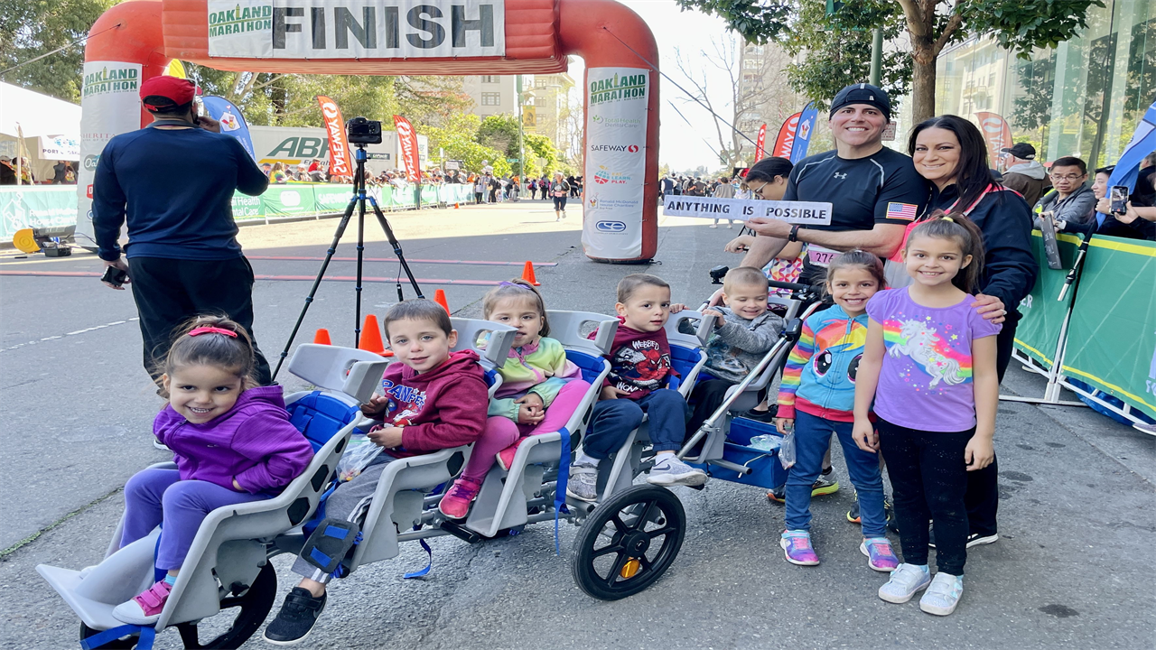 This Dad Ran a 2:19 Half Marathon While Pushing 5 Kids in a Stroller